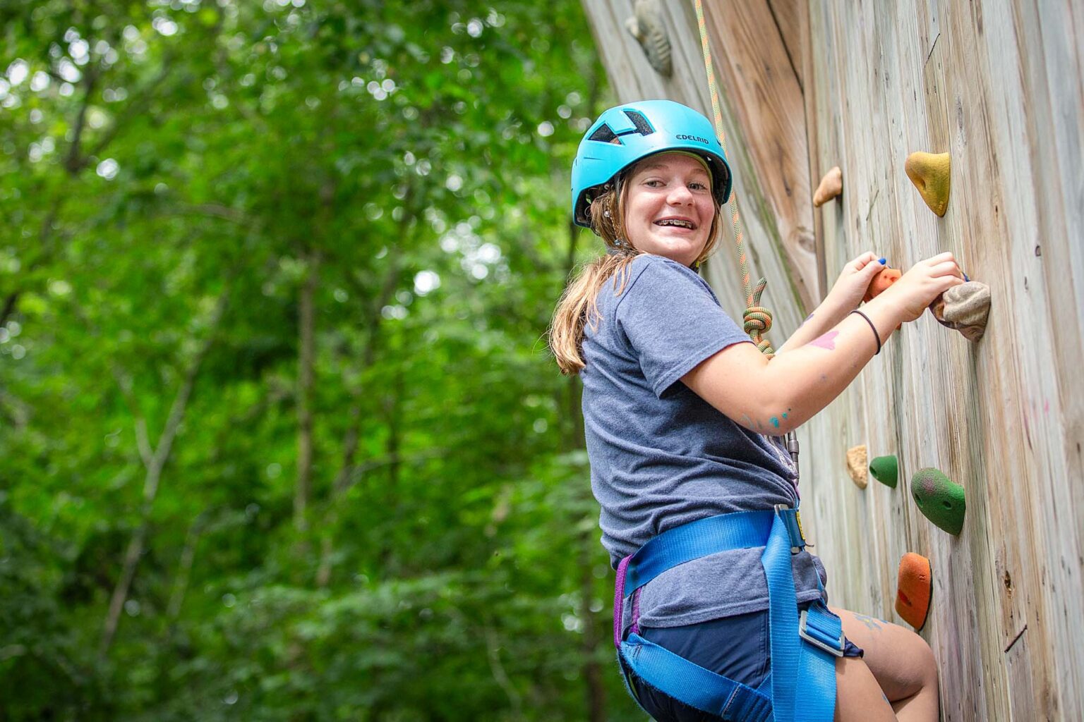 Girl on climbing wall