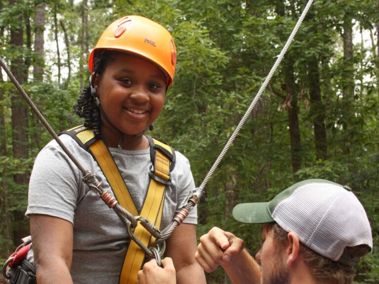 Girl getting ready for the giant swing