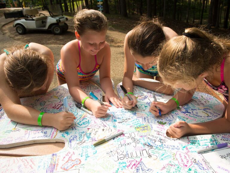 Girls writing on art collage