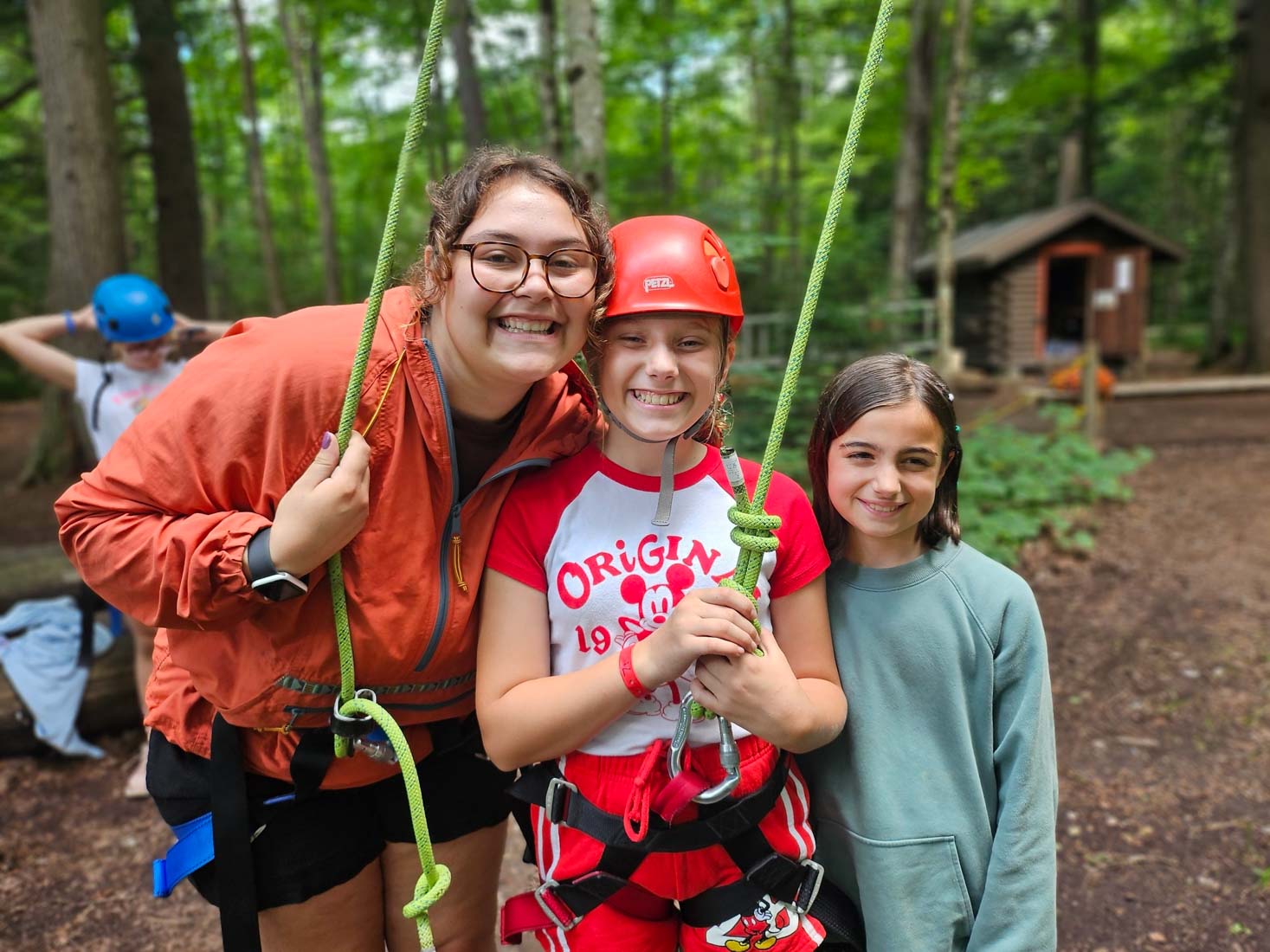 Girls wearing climbing gear