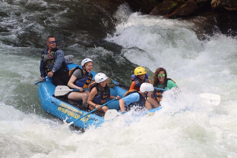 Campers whitewater rafting