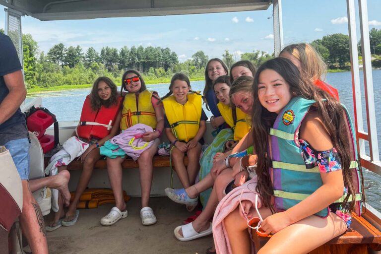 Campers on pontoon ride