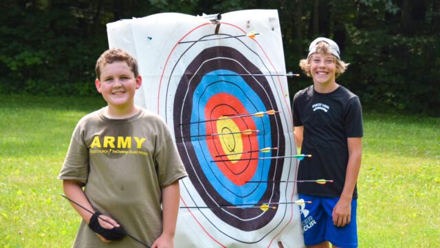 Boys near archery target