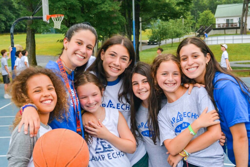 Happy girls on basketball court