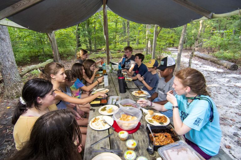 Campers eating outdoors