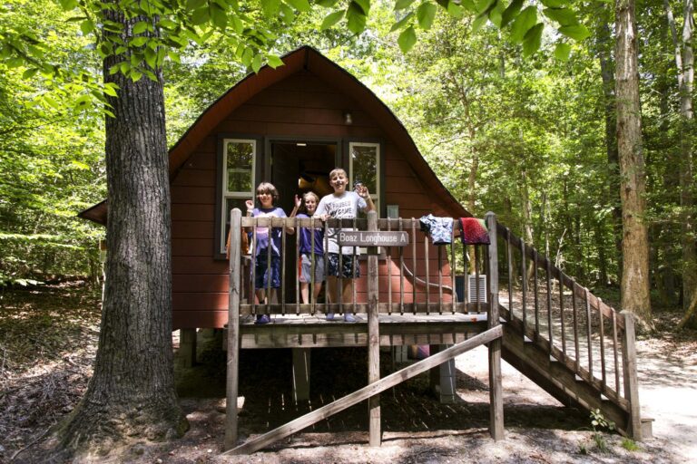 Boys outside their longhouse