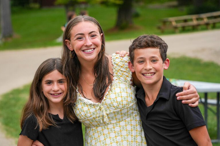 Three kids smiling