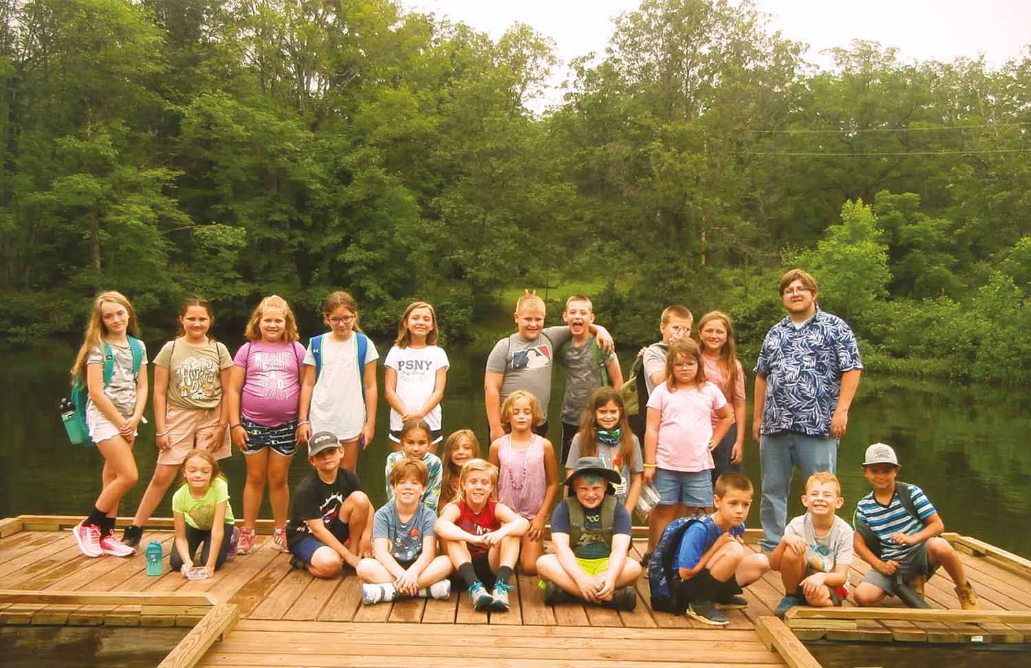 Group on pond dock