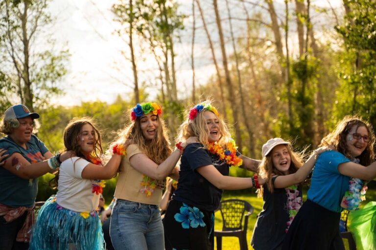 Happy campers dancing