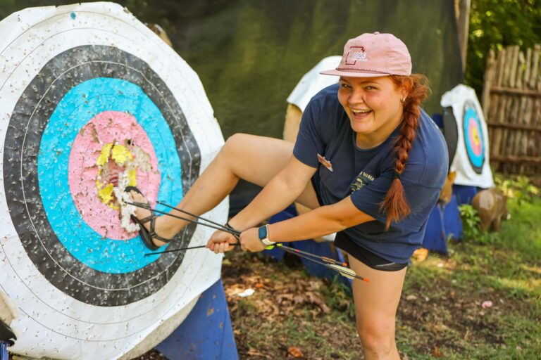 Girl near archery target
