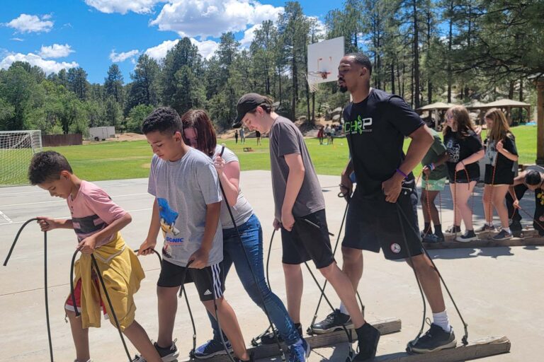 Campers doing team building exercise