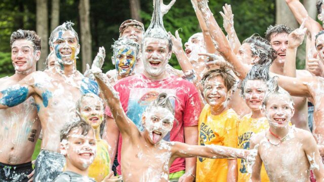 Excited boys covered in shaving cream