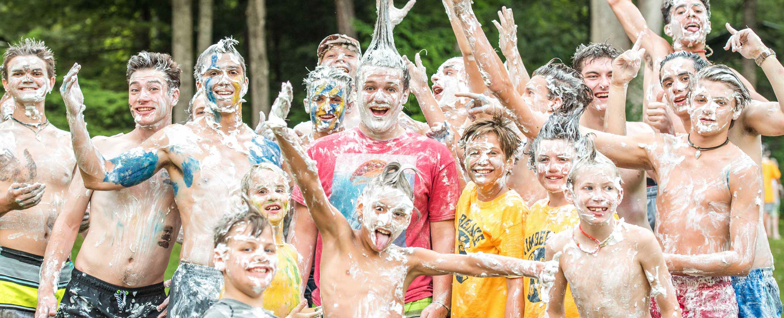 Excited boys covered in shaving cream