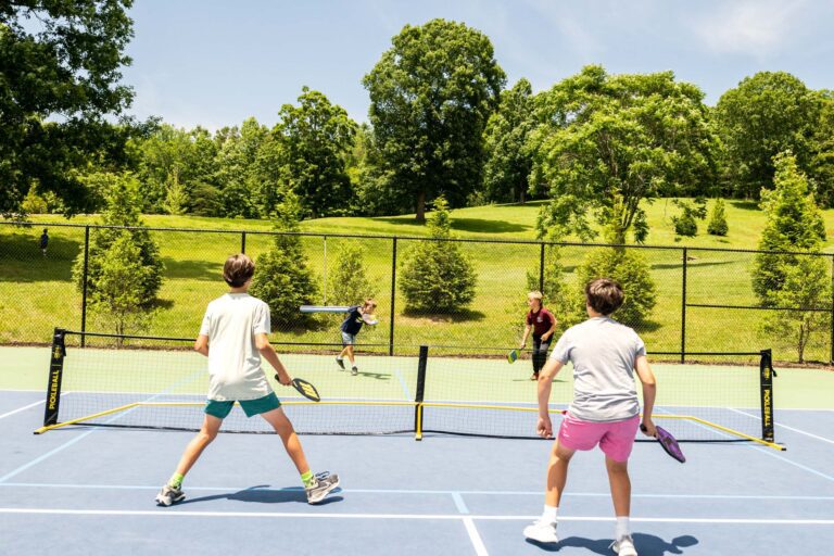 Boys playing pickleball