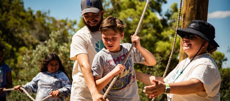 Boy on ropes course
