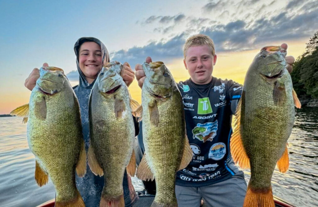 Boys holding large bass