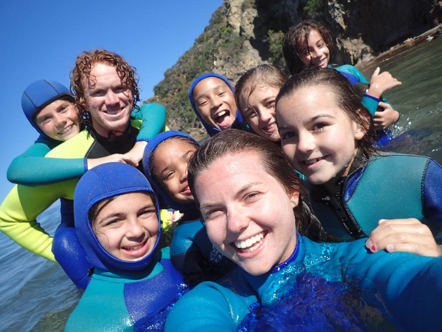 Group of campers in wetsuits