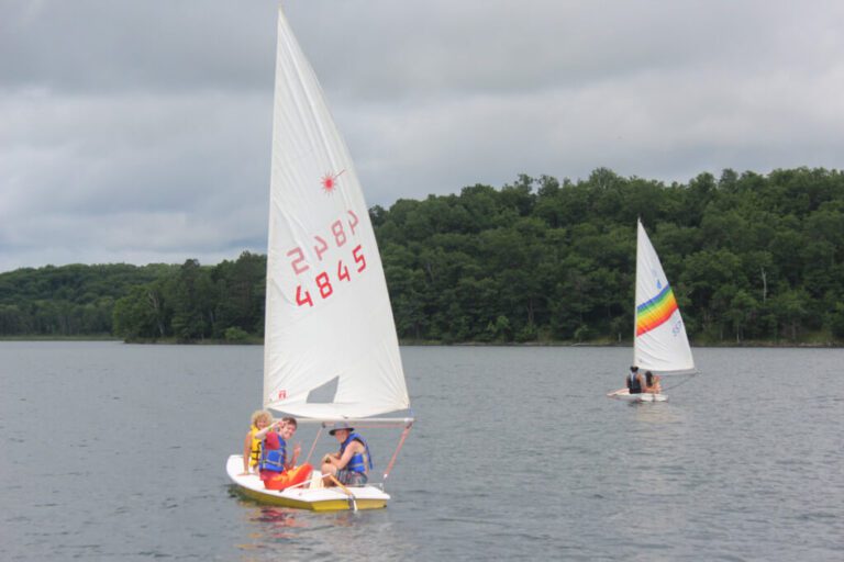 Campers in sailboats