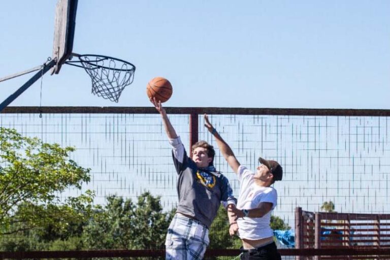 Boys playing basketball
