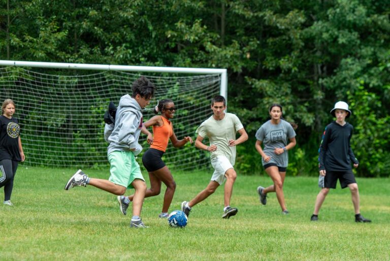 Campers playing soccer