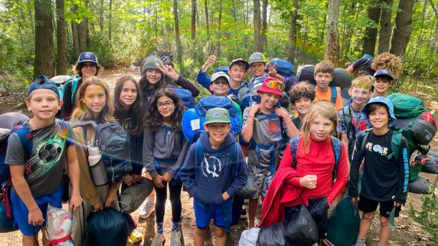 Happy group of wilderness campers
