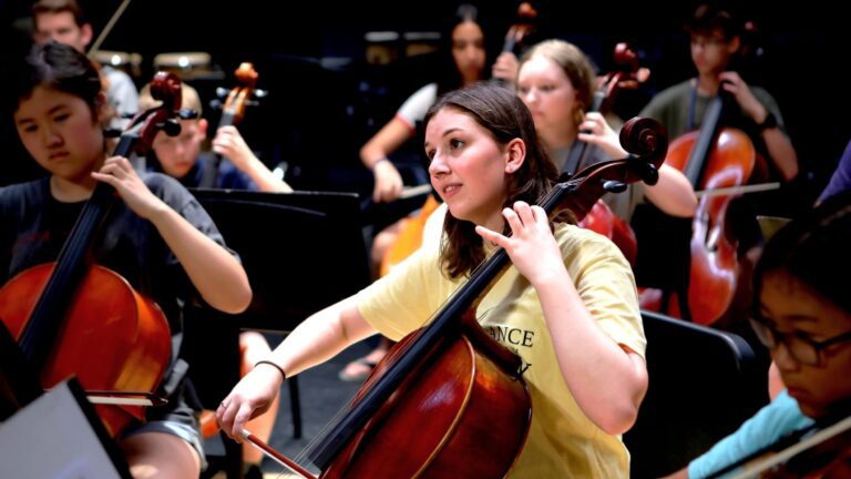 Girl playing an instrument