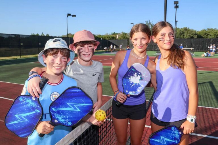 Campers playing pickleball