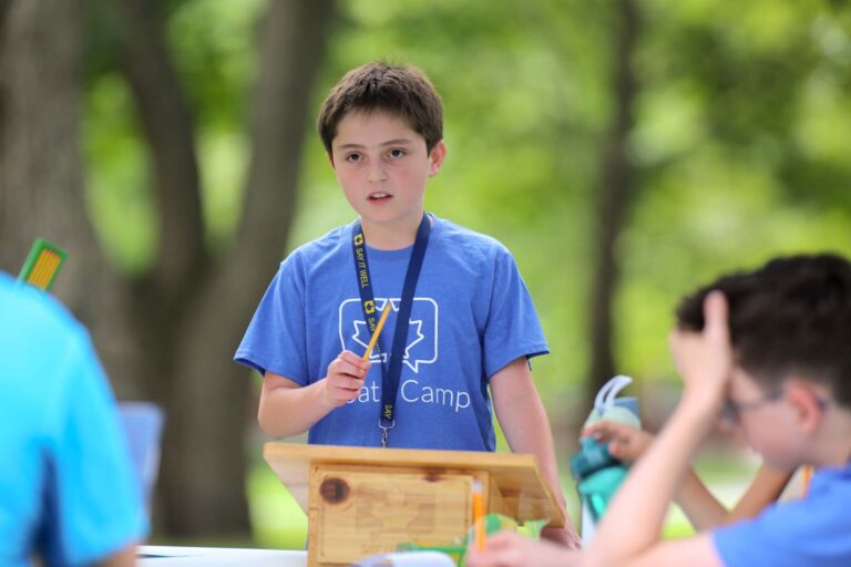 Boy presenting at podium