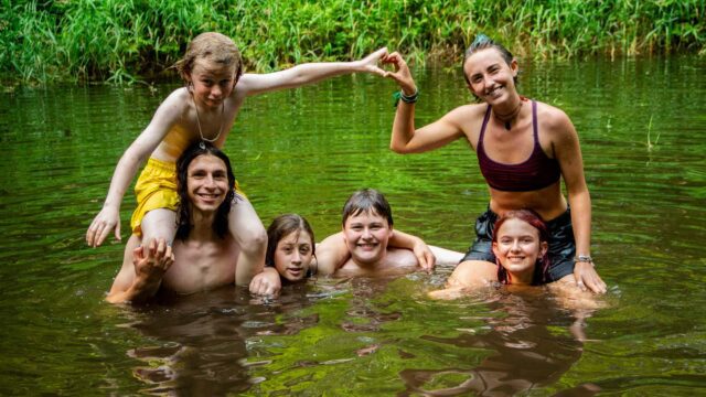 Campers in pond
