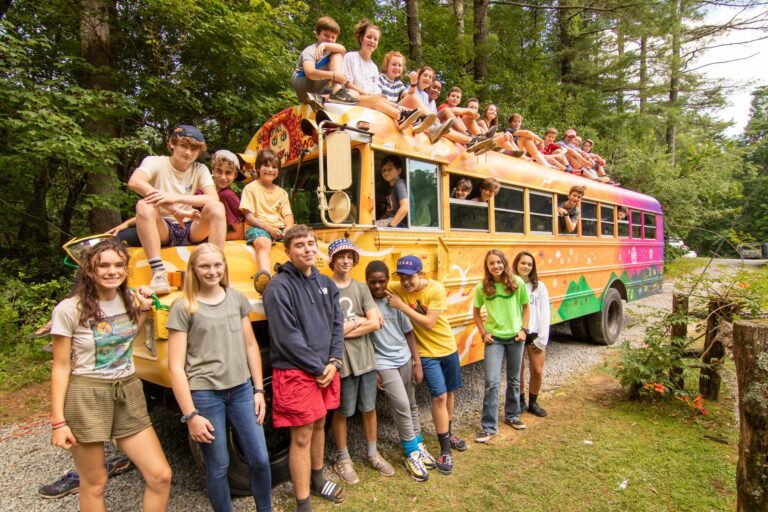Campers on yellow school bus