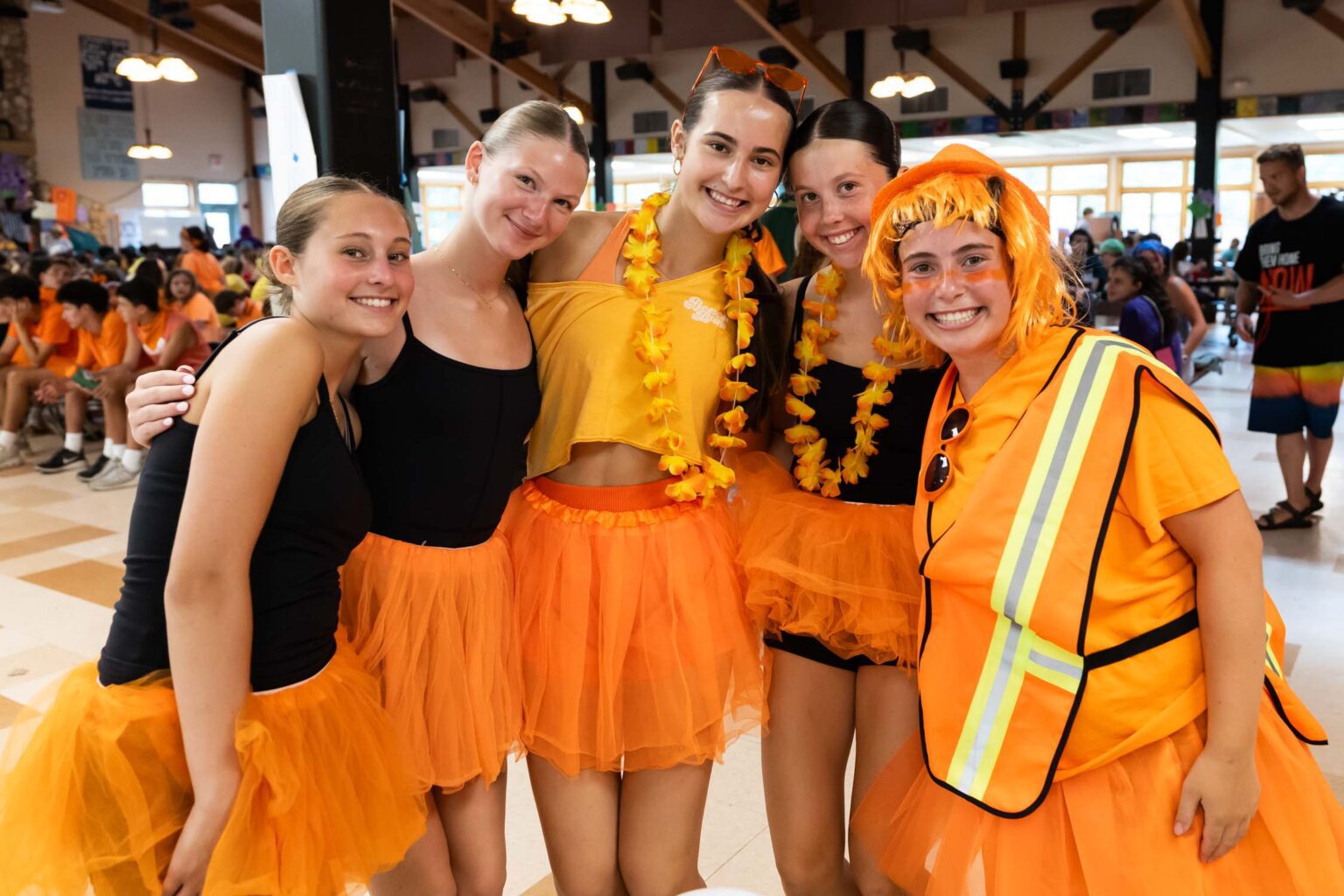 Happy campers in colorful outfits