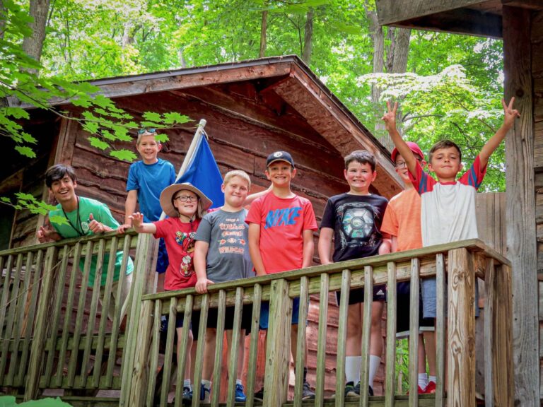 Boys outside their cabin