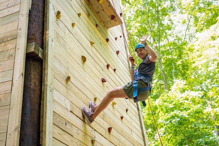 Girl on climbing wall