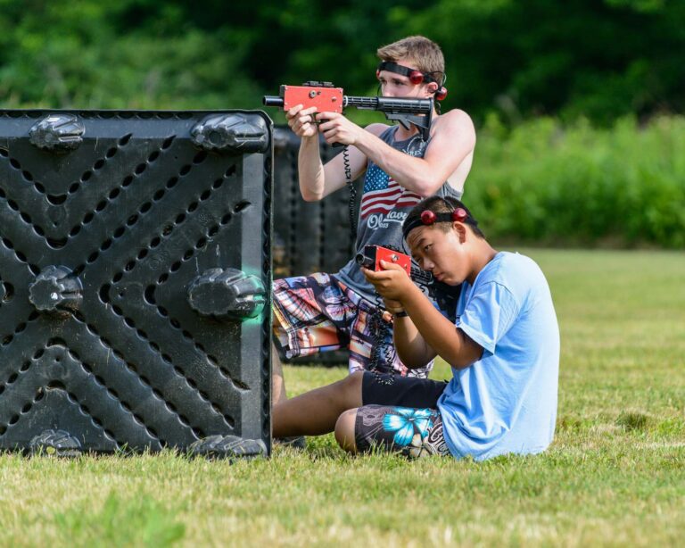 Boys playing laser tag