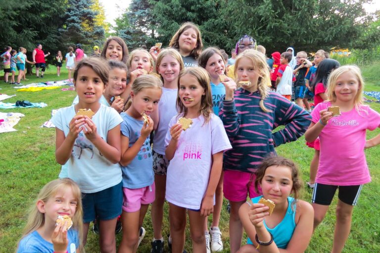Girls eating s'mores