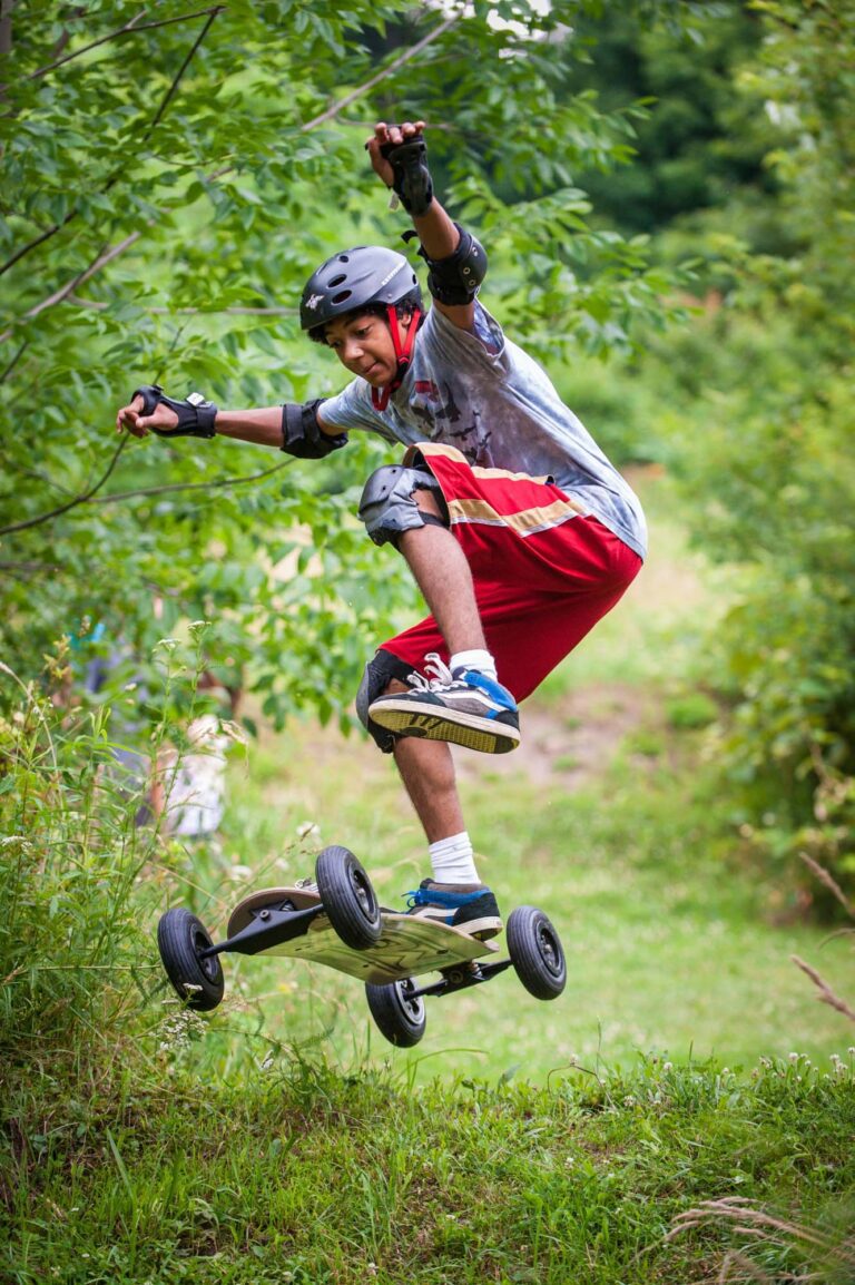 Boy mountain boarding