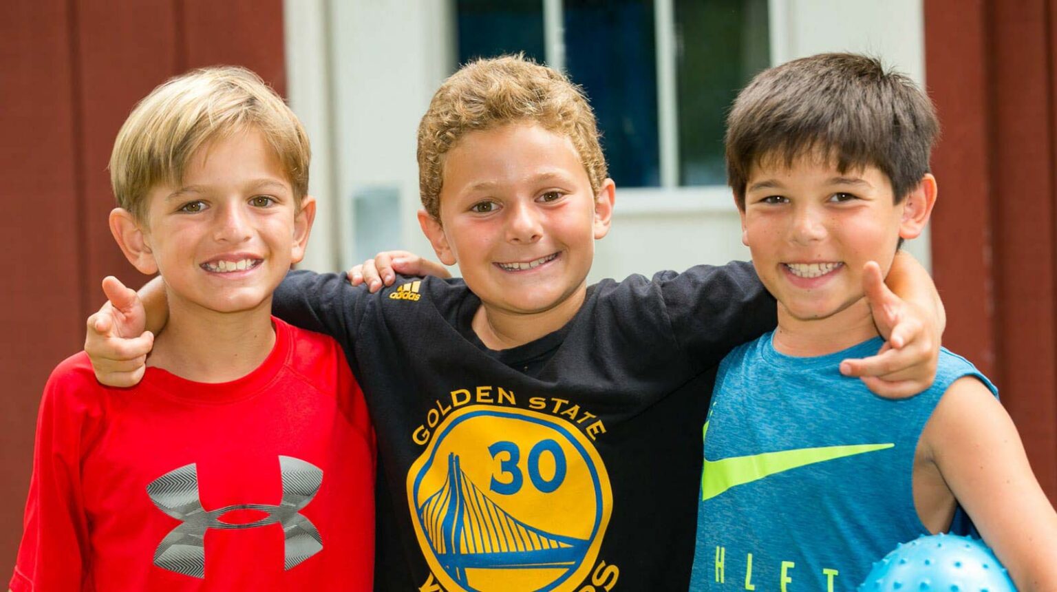Three smiling boys