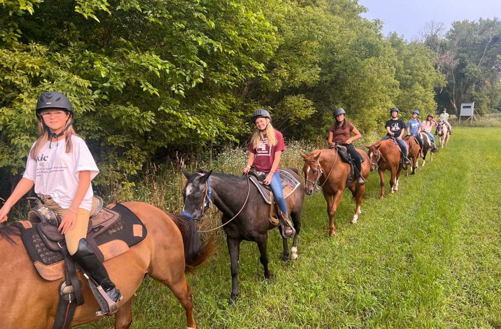 Girls on trail ride