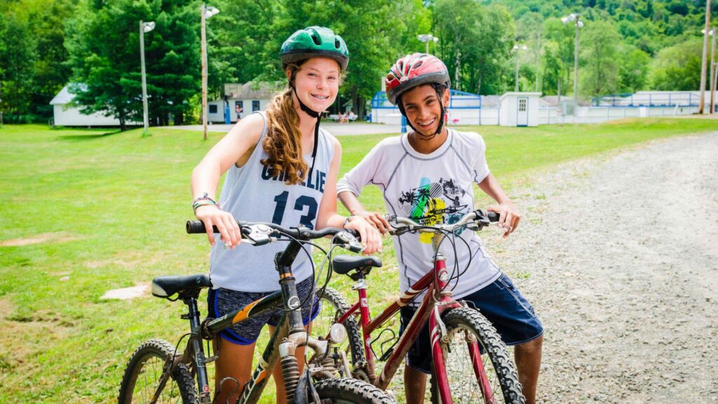 Campers riding mountain bikes