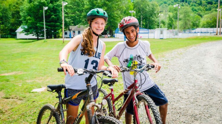 Campers riding mountain bikes