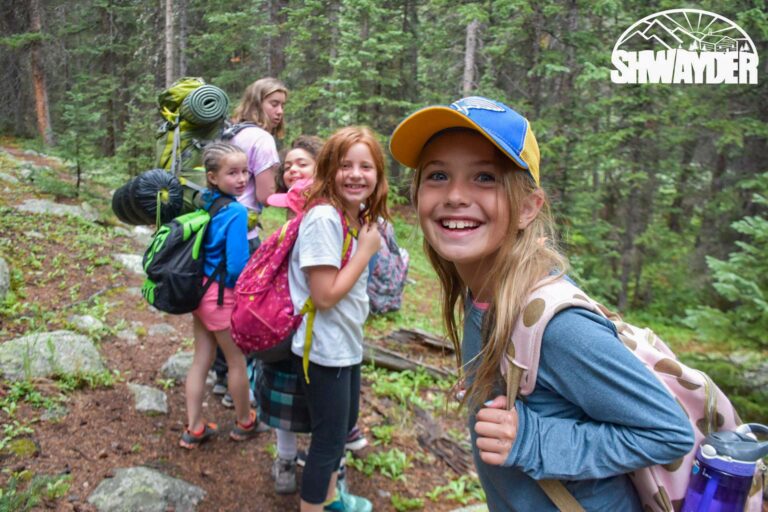 Girls hiking in the forest