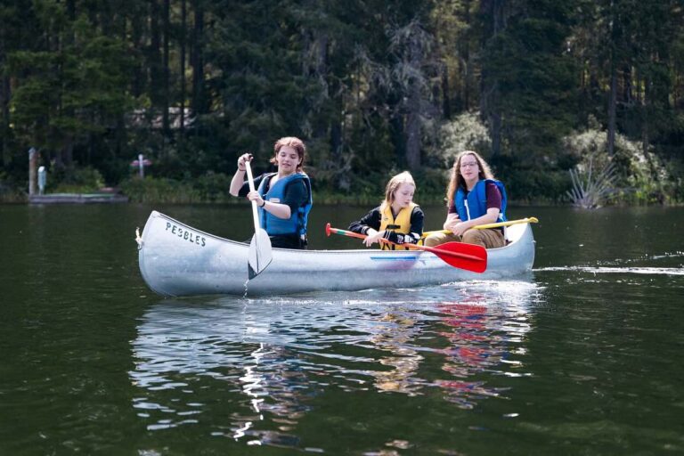 Campers in a metal canoe