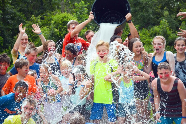 Campers getting soaked by water buckets
