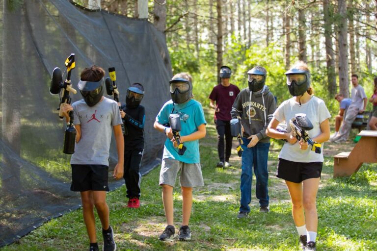 Campers playing paintball