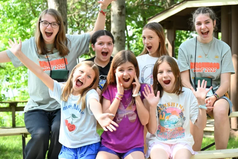 Excited girls cheering at camp
