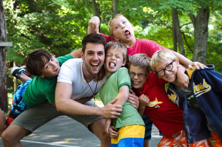 Silly group of boys with counselor