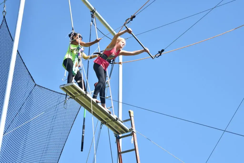 Girl on trapeze