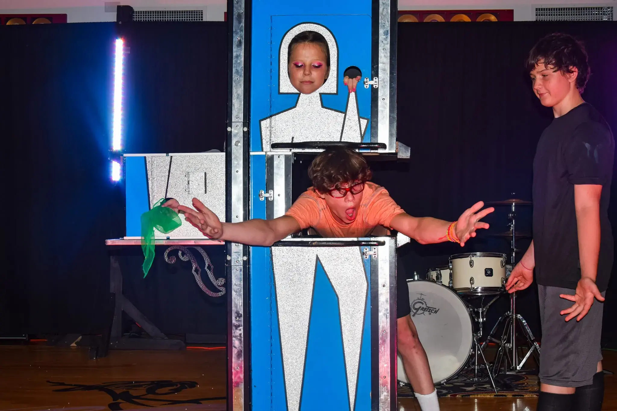 Campers performing magic trick