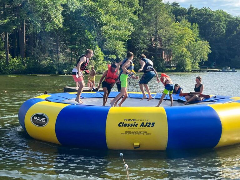 Campers on water trampoline