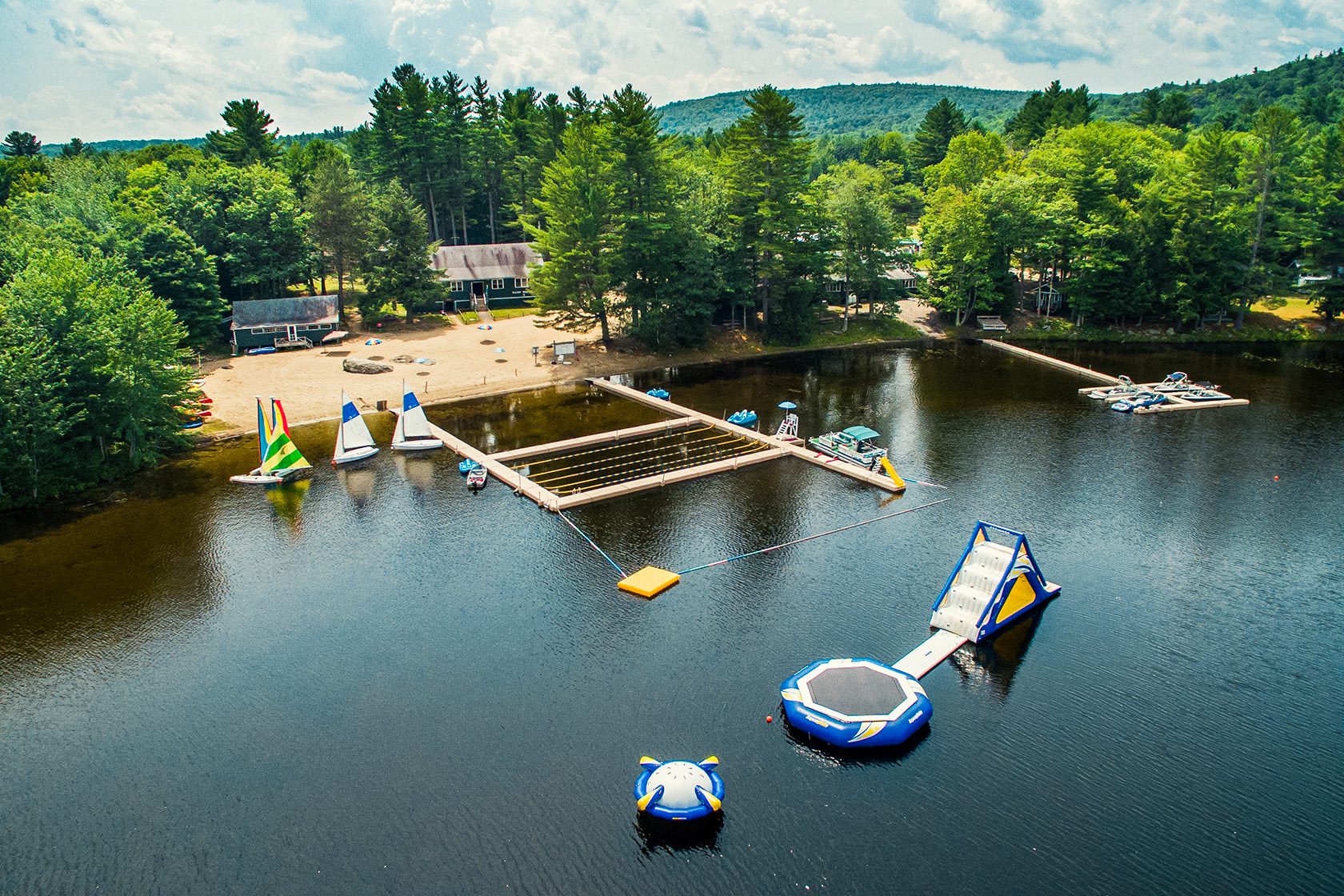 Aerial view of a camp's waterfront and docks